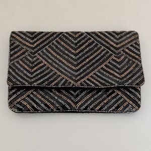 Elegant Black and Gold Clutch Bag